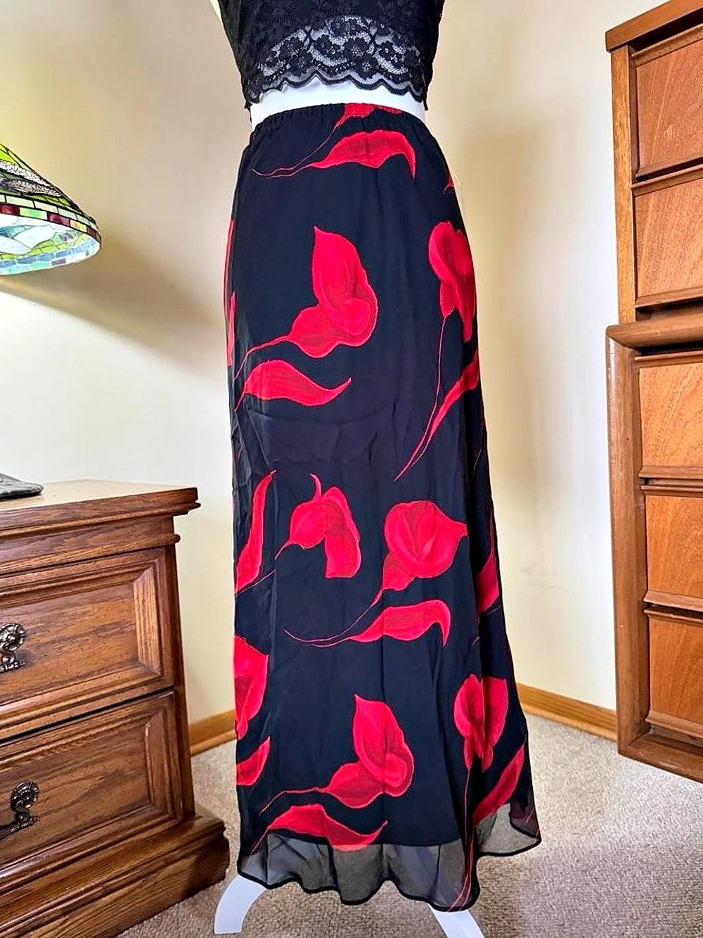 Whimsygoth black floral maxi skirt with red calla lilies, ruffle hem, and sheer